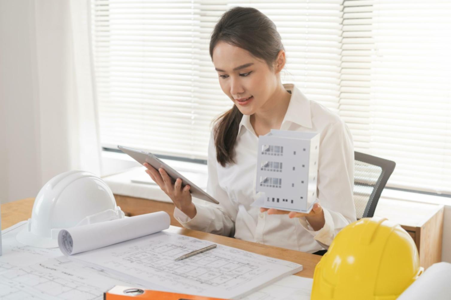 Person reviewing financial planning materials and making informed decisions